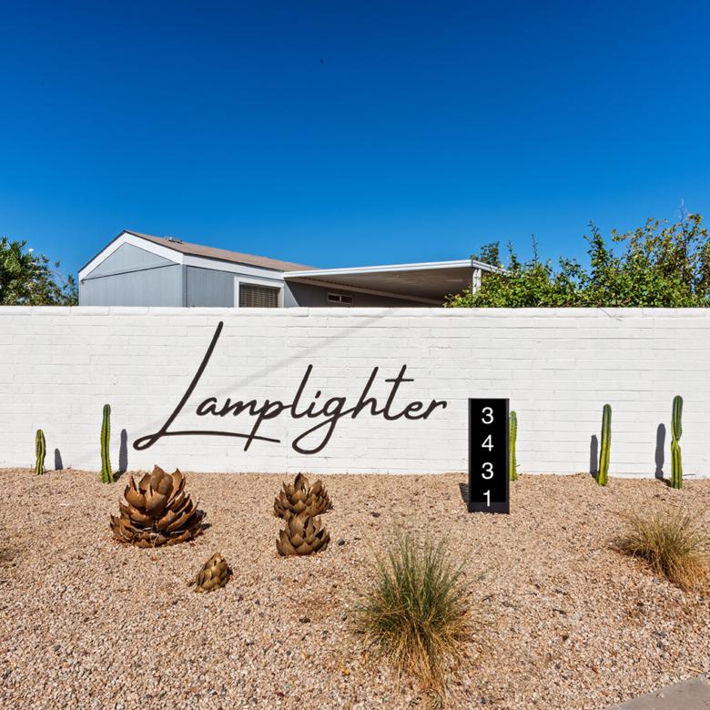 Main entrance sign at Lamplighter Mobile Home Community in Tucson, AZ