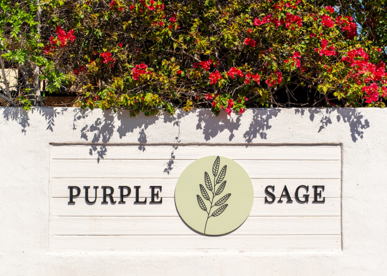 Entrance sign for Purple Sage mobile home community in Glendale, AZ